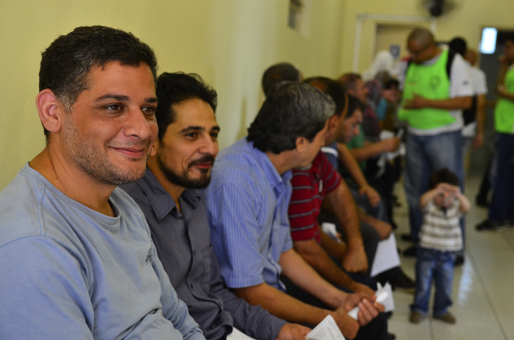Refugiados sírios durante atendimento médico no Hospital da Universidade Santo Amaro. Foto: Rovena Rosa/Agência Brasil